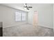 Bright bedroom with neutral carpet, ceiling fan and closet at 778 Parsons Mooring Ct, Seffner, FL 33584