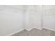 Spacious walk-in closet featuring carpet flooring and wire shelving at 778 Parsons Mooring Ct, Seffner, FL 33584