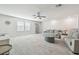 Large living room with plush carpet and stylish decor at 778 Parsons Mooring Ct, Seffner, FL 33584