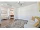 Comfortable and well-lit living space, seamlessly connects to the foyer with hardwood floors throughout at 778 Parsons Mooring Ct, Seffner, FL 33584