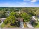 Beautiful aerial view of a suburban neighborhood with tree-lined streets and well-maintained houses at 8364 Eldridge Rd, Spring Hill, FL 34608