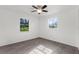 This bright bedroom has new floors and two sunny windows at 8364 Eldridge Rd, Spring Hill, FL 34608