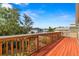 Wood deck provides great views of the neighborhood and blue sky, a perfect space for relaxation at 856 Wisconsin Ave, Palm Harbor, FL 34683