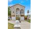 Charming home with two-car garage, a landscaped yard, and inviting front entrance at 856 Wisconsin Ave, Palm Harbor, FL 34683