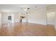 Spacious living room with hardwood floors and lots of natural light at 1005 Indigo Run Ct, Spring Hill, FL 34609