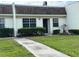 Charming single-story home with well-maintained lawn and updated windows at 11310 Carriage Hill Dr # 4, Port Richey, FL 34668