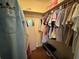 Neatly organized walk-in closet provides ample storage for clothes and accessories at 11310 Carriage Hill Dr # 4, Port Richey, FL 34668