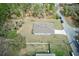 Aerial view of the home with expansive yard at 12201 Labrador Duck Labrador Duck Rd, Weeki Wachee, FL 34614