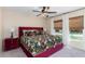 Beautiful bedroom featuring a king-size bed, dark wood accents, and neutral colors at 12201 Labrador Duck Labrador Duck Rd, Weeki Wachee, FL 34614