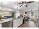 Open-concept kitchen with granite counters, stainless steel appliances, and easy access to living areas at 12201 Labrador Duck Labrador Duck Rd, Weeki Wachee, FL 34614