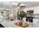 Open kitchen with granite countertops, stainless steel appliances, and modern lighting at 12201 Labrador Duck Labrador Duck Rd, Weeki Wachee, FL 34614