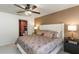 Comfortable main bedroom with ensuite bathroom, ceiling fan, and modern decor at 12201 Labrador Duck Labrador Duck Rd, Weeki Wachee, FL 34614