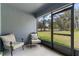 Inviting screened patio with comfortable seating and a view of the spacious backyard at 12201 Labrador Duck Labrador Duck Rd, Weeki Wachee, FL 34614