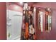 Shower area featuring a floral shower curtain and a built-in shelf with a mirror at 12201 Labrador Duck Labrador Duck Rd, Weeki Wachee, FL 34614