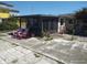 This backyard features a screened-in porch, a patio, and a seating area, perfect for outdoor entertaining at 12801 5Th Isle, Hudson, FL 34667