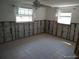 Bedroom needs renovations and updates, but has lots of light at 12801 5Th Isle, Hudson, FL 34667