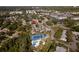 Residential area featuring a community pool and tennis court at 152 Chelsea Ct, Dunedin, FL 34698