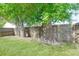 Spacious backyard with well-maintained lawn and mature trees at 152 Chelsea Ct, Dunedin, FL 34698