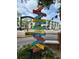 Colorful signpost directing visitors to various shops and galleries for an engaging experience at 152 Chelsea Ct, Dunedin, FL 34698