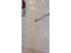 Bathroom tile showing grab bar at 2309 Terrace View Ln, Spring Hill, FL 34606