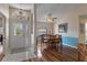 Dining area with wood table, chairs, and natural light from a window at 2309 Terrace View Ln, Spring Hill, FL 34606