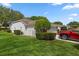 The house has a well-maintained lawn, adding to the curb appeal of the property at 2309 Terrace View Ln, Spring Hill, FL 34606