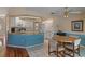 Open concept kitchen with breakfast bar, ideal for casual dining and socializing at 2309 Terrace View Ln, Spring Hill, FL 34606
