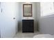Bathroom featuring a vanity with a modern sink, mirror and fixtures at 23310 Cascade Pl, Land O Lakes, FL 34639