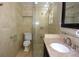 Bathroom featuring sleek glass shower, granite countertop and modern fixtures at 23310 Cascade Pl, Land O Lakes, FL 34639