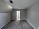 Carpeted bedroom with neutral walls leading to a bathroom with a white toilet at 23310 Cascade Pl, Land O Lakes, FL 34639