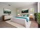 Comfortable bedroom featuring modern decor, ample natural light and neutral paint at 23310 Cascade Pl, Land O Lakes, FL 34639