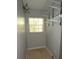 Functional closet space with adjustable shelving and a window for ventilation at 23310 Cascade Pl, Land O Lakes, FL 34639