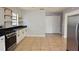 Kitchen featuring stainless steel appliances, granite countertops, and ample cabinet space at 23310 Cascade Pl, Land O Lakes, FL 34639