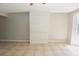 Living room showcasing neutral paint and accent shiplap wall at 23310 Cascade Pl, Land O Lakes, FL 34639