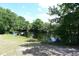 Secluded pond surrounded by lush trees offers a peaceful and serene setting at 23310 Cascade Pl, Land O Lakes, FL 34639