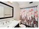 Bathroom featuring a decorative shower curtain and dark wood vanity at 290 Winchester Way, Palm Harbor, FL 34684