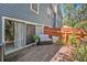 Outdoor deck with plenty of potted plants at 290 Winchester Way, Palm Harbor, FL 34684