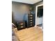 A bedroom with furniture, including a dresser and nightstand, offering storage and style at 3037 Jacob Crossing Ln, Holiday, FL 34691