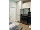 View of stainless steel refrigerator and eat in kitchen with natural light at 3037 Jacob Crossing Ln, Holiday, FL 34691
