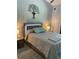 Stylish bedroom featuring unique decor, ambient lighting, and a calming atmosphere at 3054 Pelican Pl, Clearwater, FL 33762