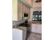 Contemporary kitchen with stylish countertops and modern appliances, perfect for cooking at 3054 Pelican Pl, Clearwater, FL 33762