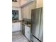 Well-equipped kitchen with stainless steel appliances and contemporary countertops at 3054 Pelican Pl, Clearwater, FL 33762