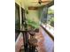 Charming patio featuring tile flooring and outdoor furniture for relaxation and enjoyment at 3054 Pelican Pl, Clearwater, FL 33762
