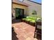 Inviting patio with comfortable seating, sliding glass doors, and tiled flooring at 3054 Pelican Pl, Clearwater, FL 33762
