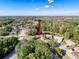 Aerial view showing the property's location within a leafy neighborhood setting at 3142 Crenshaw Ct, New Port Richey, FL 34655