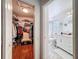 View of closet and bright bathroom featuring new vanity, stylish fixtures, and modern finishes at 3142 Crenshaw Ct, New Port Richey, FL 34655