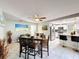 Inviting dining room adjacent to the open kitchen, perfect for entertaining and Gathering gatherings at 3142 Crenshaw Ct, New Port Richey, FL 34655