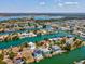 Gorgeous aerial view of waterfront homes, canals, and lush landscape in a beautiful community at 3215 Hibiscus Dr, Hernando Beach, FL 34607