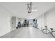 Spacious garage with ample storage space, white walls, and an overhead door at 3215 Hibiscus Dr, Hernando Beach, FL 34607