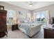 Bedroom with natural light, decorative wall art, and patio access at 3215 Hibiscus Dr, Hernando Beach, FL 34607